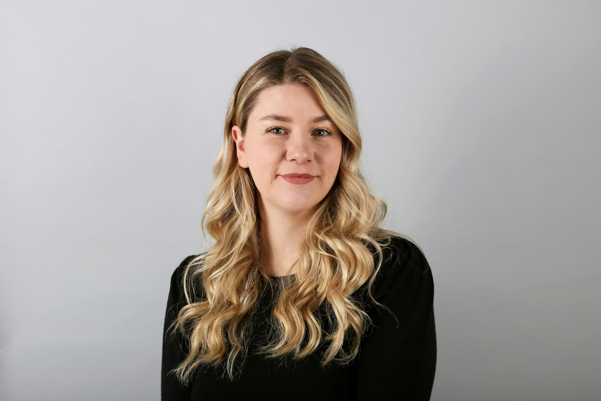 Portrait of a woman in business dress in an office